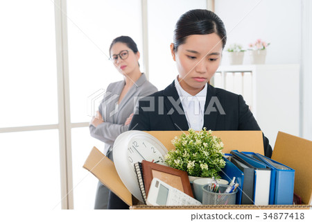 sad pretty office worker girl losing company job sad pretty office worker girl losing company job 34877418