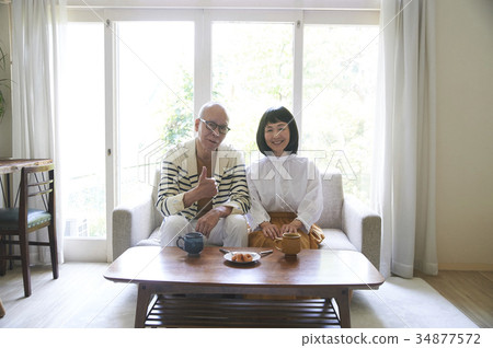 Senior couple drinking coffee 34877572