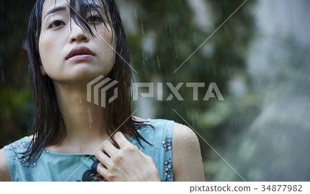 Woman struck by the rain Woman struck by the rain 34877982