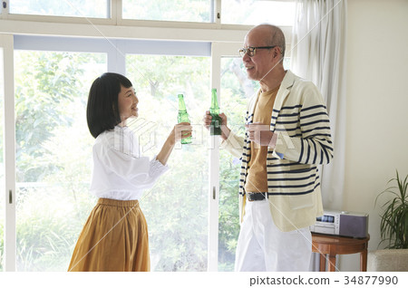 Senior couple toasting 34877990