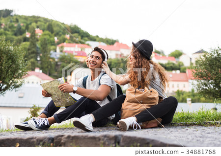 Two young tourists with map in the old town 34881768