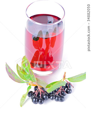 Glass of aronia juice with berries Glass of aronia juice with berries 34882050