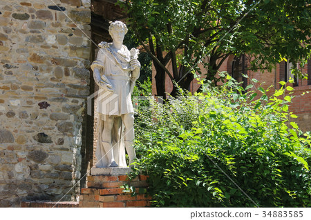 Marble statue of St. Cosmas at the entrance church Marble statue of St. Cosmas at the entrance church 34883585