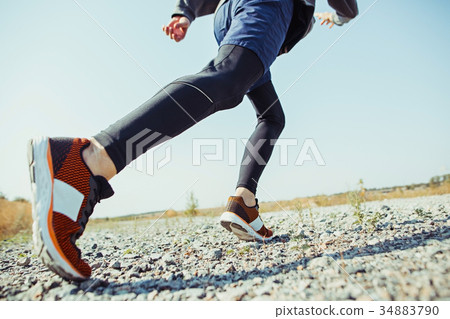 Running sport. Man runner sprinting outdoor in Running sport. Man runner sprinting outdoor in 34883790