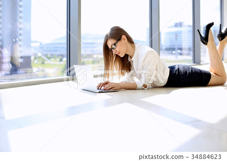Modern business woman working with laptop compute Modern business woman working with laptop compute 34884623