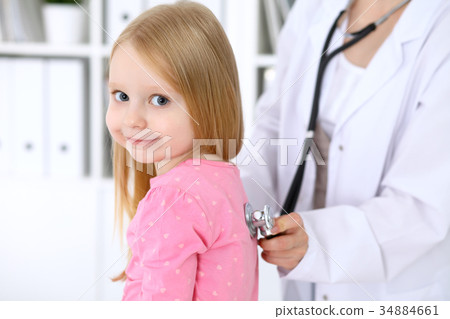 Pediatrician is taking care of baby in hospital 34884661