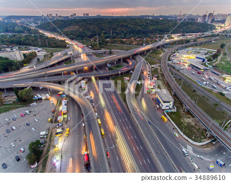 Traffic on freeway interchange. Aerial night view Traffic on freeway interchange. Aerial night view 34889610