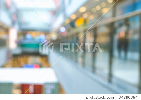 Blurred mall center space with windows shops 34890364