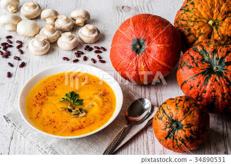 Pumpkin soup with seeds and parsley. Vegan food Pumpkin soup with seeds and parsley. Vegan food 34890531