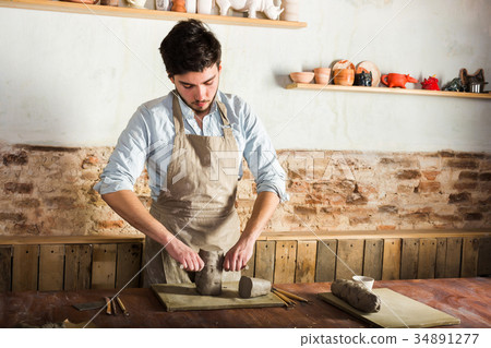 potter, clay workshop, ceramics art concept - 34891277