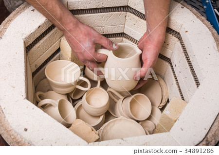 pottery, workshop, ceramics art concept - close-up 34891286
