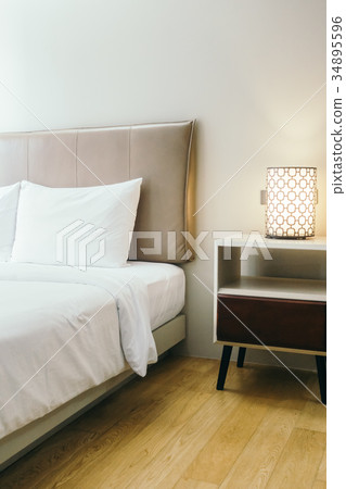 White pillow on bed White pillow on bed 34895596