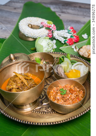 Northern Thai food with banana leaf background 34896278