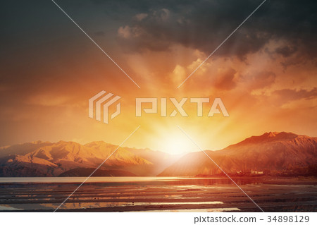 Sunrise above mountain 34898129