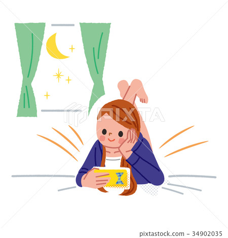 Woman looking at smartphone before going to bed 34902035