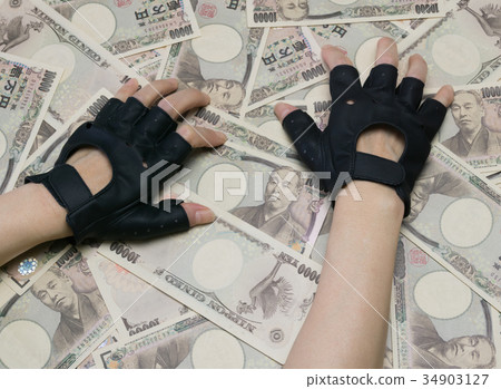 手試圖抓住很多錢 手試圖抓住很多錢 34903127