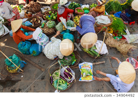 Flower vendors at the Hoi An market, Vietnam 34904492