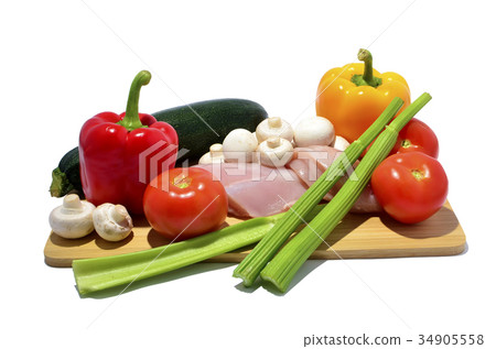 chicken, knife and vegetables. chicken, knife and vegetables. 34905558