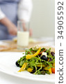 fresh Greek salad on white plate 34905592