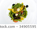 fresh Greek salad on white plate 34905595