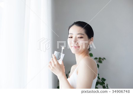 Woman tooth brushing dental care 34906748