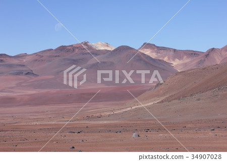 Atacama highland desert area and beautiful Andes mountain range in northern South America Chile in sunny Atacama highland desert area and beautiful Andes mountain range in northern South America Chile in sunny 34907028