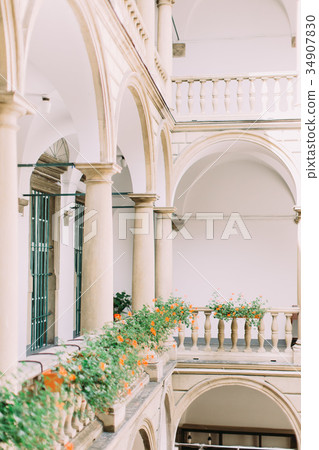 Lovely decorated old balconies with flowers. 34907830