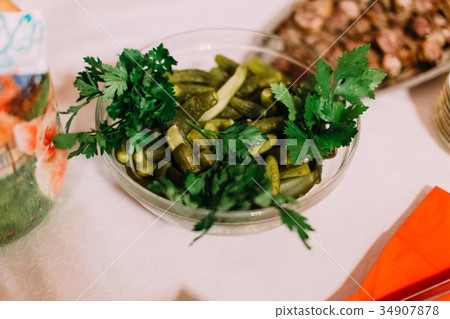 The wedding dish consisted of cucumbers decorated The wedding dish consisted of cucumbers decorated 34907878