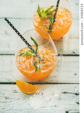 Refreshing cold alcoholic summer cocktail with 34908314