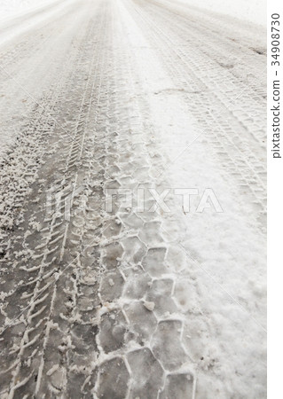 car tire imprint on the snow melted car tire imprint on the snow melted 34908730