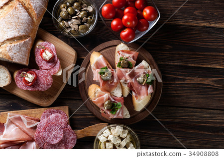 Spanish tapas with slices jamon serrano 34908808