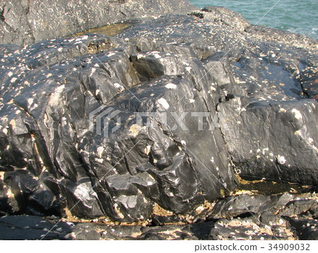 Grey natural stone texture photo background. Grey natural stone texture photo background. 34909032