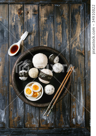 Rice balls and eggs Rice balls and eggs 34910822
