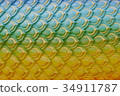Stucco pattern of green-yellow fish scales. 34911787