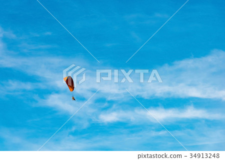 man ride Paramotor flying in the sky man ride Paramotor flying in the sky 34913248