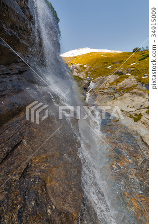 Alpine waterfall, Grossglockner in Austrian Alps. Alpine waterfall, Grossglockner in Austrian Alps. 34915009