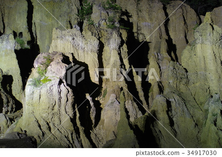 Earth pillar of lighted up night 34917030