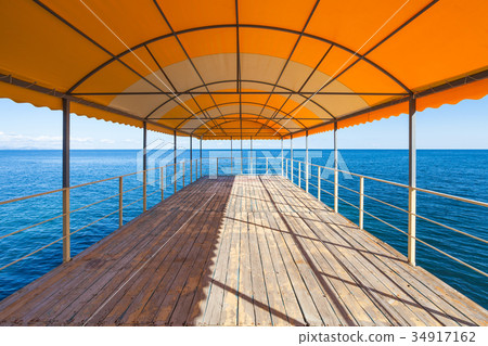empty outdoor solarium over Black Sea empty outdoor solarium over Black Sea 34917162