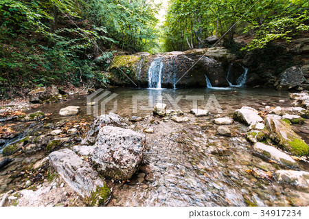 small waterfall on Ulu-Uzen river in Haphal Gorge 34917234