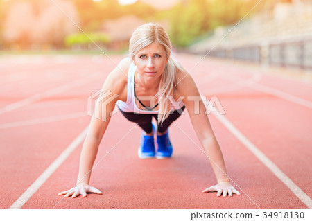 young woman at stadium 34918130