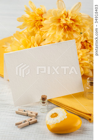 Chrysanthemum flowers on a wooden table, 34918403