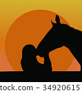 Silhouettes of a girl kissing a horse in the nose  34920615