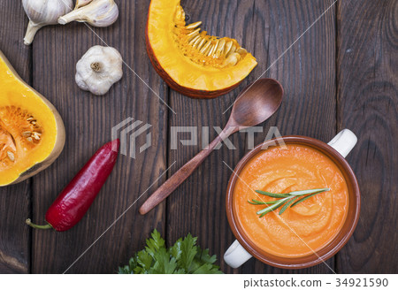 pumpkin soup in a ceramic plate with handles pumpkin soup in a ceramic plate with handles 34921590