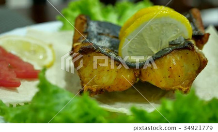Dish of fish. Fried shark eating on a plate with 34921779
