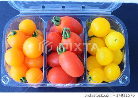 Variety of cherry tomatoes. Red, yellow and orange 34931570
