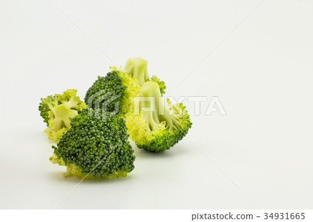 Raw broccoli isolated on white background Raw broccoli isolated on white background 34931665