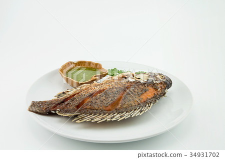 Fried Tilapia fish with spicy sauce. thai food 34931702