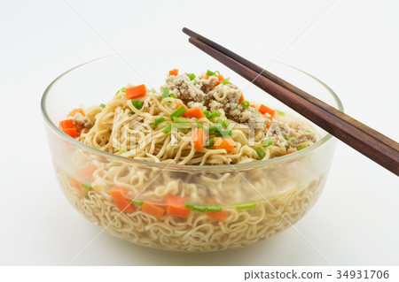 Bowl of instant noodles on white background.  34931706