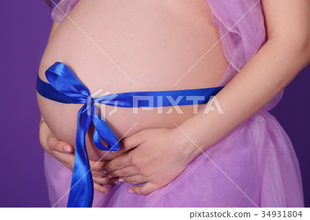 Pregnant young lady woman posing Pregnant young lady woman posing 34931804