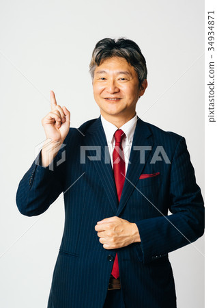 Businessman middle man pointing 34934871